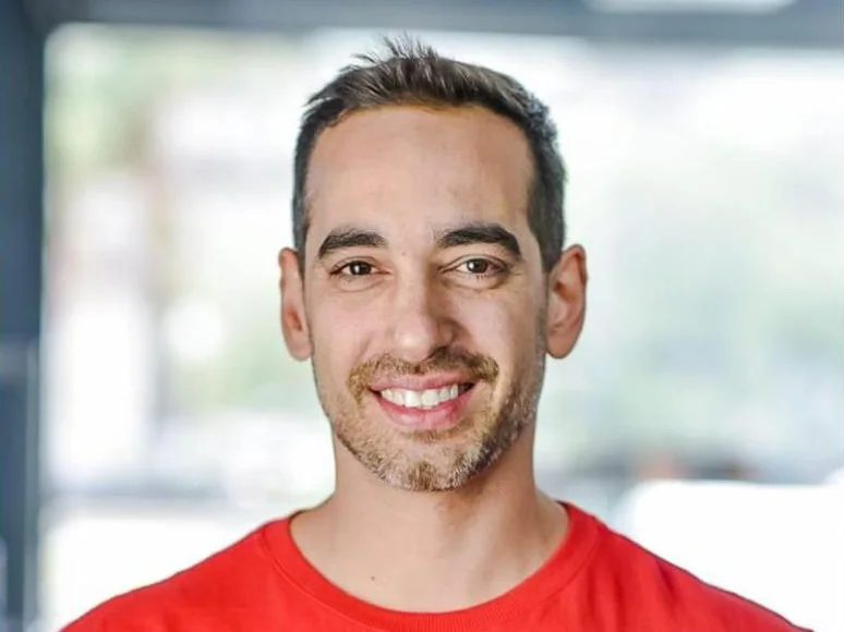 Retrato de André Carrion sorrindo